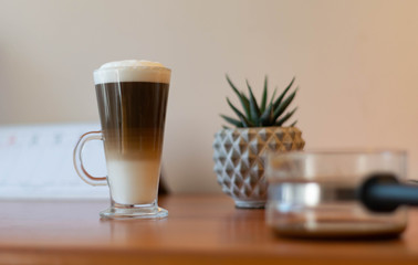 cup of coffee of wooden table