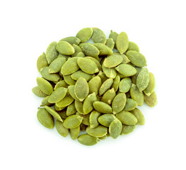 pumpkin seeds on white background.