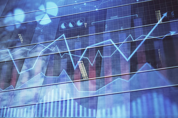 Forex chart on cityscape with tall buildings background multi exposure. Financial research concept.
