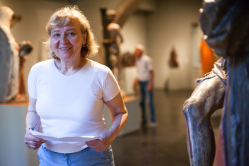 Woman with guidebook at Museum © JackF