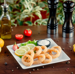 fried calamary rings on the table