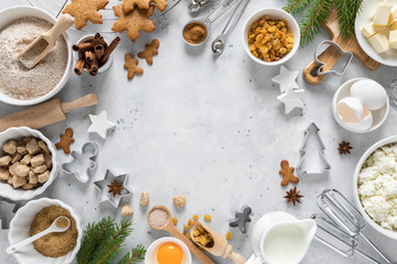 Christmas or Xmas baking culinary background. Ingredients for cooking on kitchen table. New Year or Noel holiday festive decorations