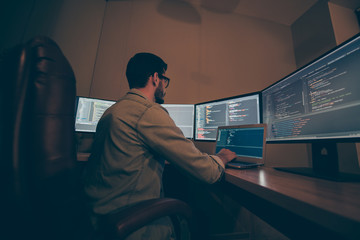 Profile side view of his he nice senior experienced skilled smart clever brunet guy providing tech...