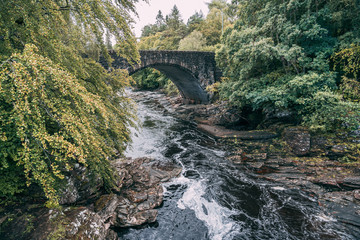 Fototapeta na wymiar A view of a bridge in the Highlands of Scotland 