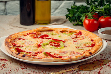 pizza with bell pepper on the table ___
