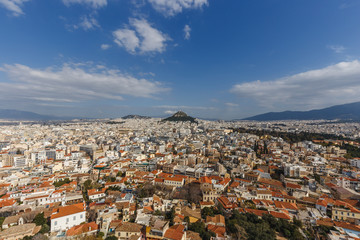 Fototapeta na wymiar Athens cityscape, and Lycabettus Hill with blue sky