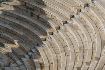 Close-up view of the steps in the Odeon of Herodes Atticus, a famous attraction in Acropolis of Athens, Greece