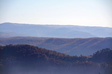 fog in the valleys over the village