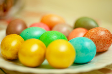 Fototapeta na wymiar Colorful Easter eggs on a plate