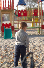 Little boy child cheerful joyful at the beach