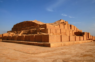 Fototapeta na wymiar Brick ziggurat (13th century BC) in Choqa Zanbil, Iran. The best example of Elamite architecture. One of Iran's UNESCO World Heritage sites.