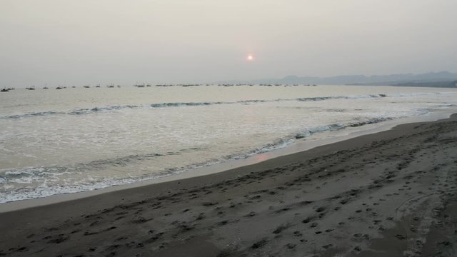 Aerial 4K drone flying over Tropical Beach of Pelabuhan Ratu in Suka Bumi, West Java, Indonesia. Drone Videos on tropical beach
