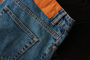 Beautiful blue and black jeans close up