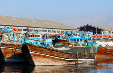 Fototapeta na wymiar Authentic iranian boats. Port of Bandar Abbas, Persian Gulf, Iran.