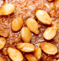 Sesame seeds on a brown crust of bread