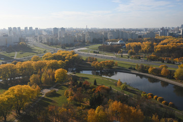 Aerial view of Minsk city. Autumn Victory Park and Svisloch River. Belarus