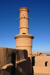 Minaret. Medieval adobe mud-brick village of Kharanaq. Iran.