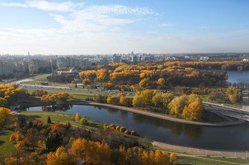 Aerial view of Minsk city. Autumn Victory Park and Svisloch River. Belarus