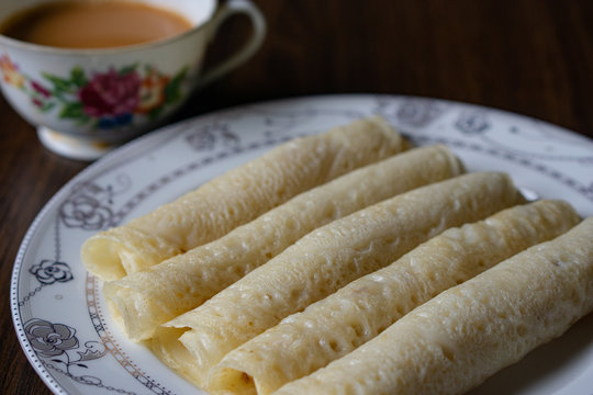 Traditional Malaysian pancake called "lempeng" with curry.