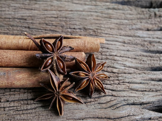 Cinnamon, herbs and spices, anise on the wooden floor