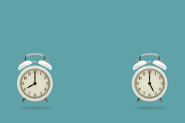White retro alarm clock show time to work 8:00am - 5:00pm on blue pastel color background