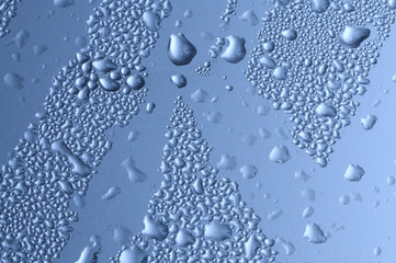Close-up large drops of water on glass