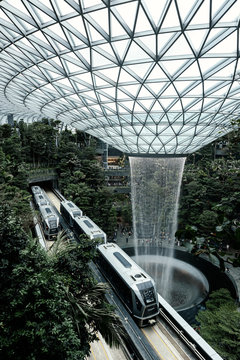 SINGAPORE-MAY 22, 2019_The HSBC Rain Vortex, the world's largest indoor waterfall at 40m tall, in Jewel Changi Airport, a mixed-use development at Changi Airport in Singapore, opened on 17 April 2019