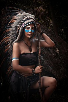 Portrait Of Beautiful Native American,indian Woman Posing In The Wild Forest.hold Dreamcatcher In Hand.