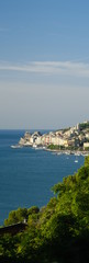 Panorama from the top of Portovenere, near the Cinque Terre, at sunrise light. The bay with the marina, the fort, the church of San Pietro.