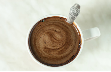 Cup of black coffee top view. Americano in mug for breakfast