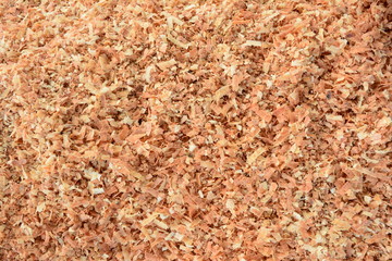 the rough background from stack of dry sawdust