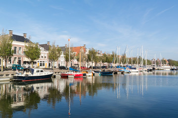 Fototapeta na wymiar Noorderhaven canal in old town of Harlingen, Netherlands
