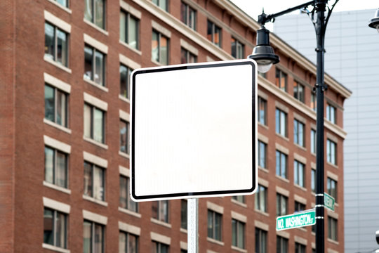 blank billboard in the city empty sign road traffic signal route city building condominium apartment info daylight summer windows on a blur background