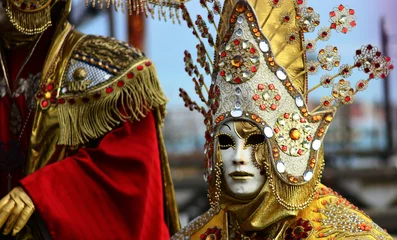 Gordijnen a beautiful yellow carnival costume © corradobarattaphotos