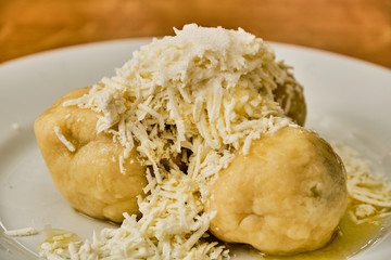 Curd dumplings on white plate