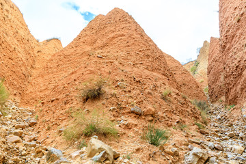 Valley eroded by rain and wind forming ravines in the red clay called Las Carcavas in Madrid