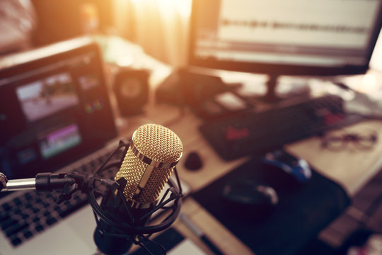 Condenser microphone golden in the studio recording creating the sound effect for the content creator