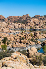 Watson Lake Beautiful Orange and Grey Stones and Water