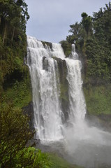 Naklejka premium Waterfall in Laos. South East Asia Forest