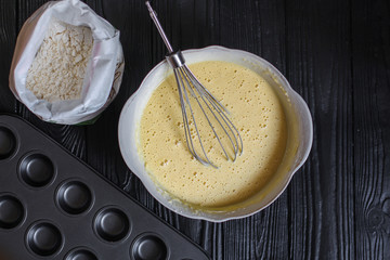 dough liquid, raw ingredients (eggs, flour, sugar, salt and more) menu concept. food background. copy space. Top view