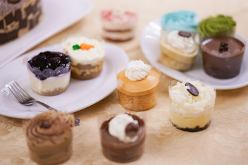 Cupcakes. Colorful cupcakes for takeaway with soft focus on the Thai tea cupcake.