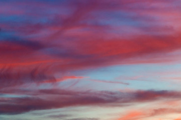 Purple sunset background in summer sky