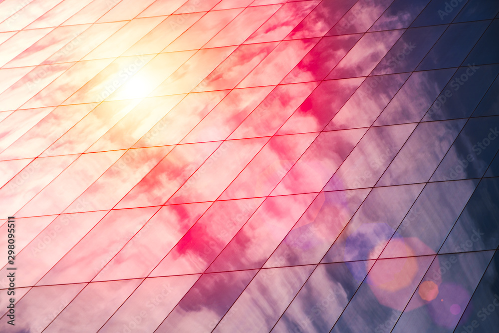 Poster web banner modern glass architecture with reflection of red and blue sunset sky. dramatic bright col