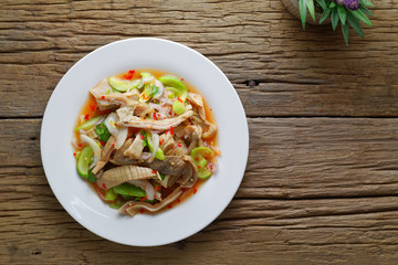 Thai food,Spicy salad boiled pig stomach with cucumber and Shallot mixed with spicy sauce