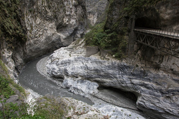 Taroko Gorge is an impressive 19-km-long canyon, situated near Taiwan's east coast. The area of the gorge is also identified as Taroko Gorge National Park. The upward thrust of hard rock, combined wit