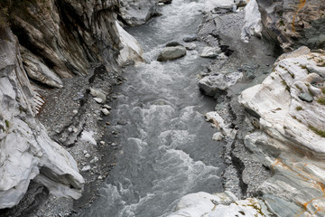 Taroko Gorge is an impressive 19-km-long canyon, situated near Taiwan's east coast. The area of the gorge is also identified as Taroko Gorge National Park. The upward thrust of hard rock, combined wit