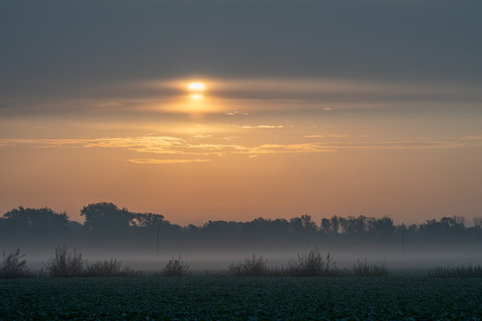 sunset over field © Latvianphotographer
