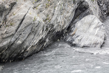 Taroko Gorge is an impressive 19-km-long canyon, situated near Taiwan's east coast. The area of the gorge is also identified as Taroko Gorge National Park. The upward thrust of hard rock, combined wit