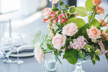 Luxury wedding table decoration. Special event table set up. Fresh flower decoration. Pastel colors - blue and pink decoration