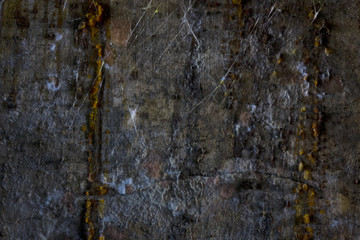 Texture. A fragment of the wall of an old wet basement covered with drops of tar, white mold and...